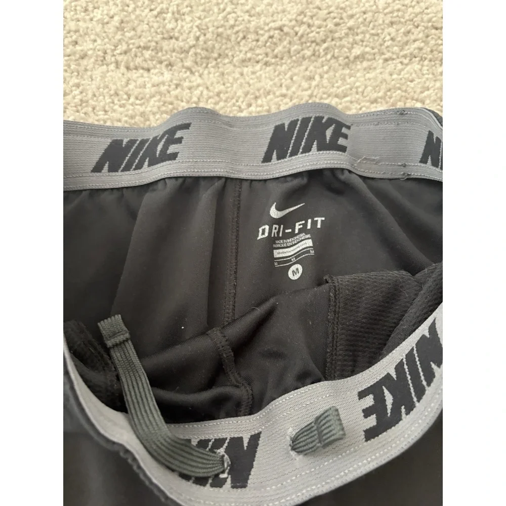Nike Ohio State Buckeyes Mens M Dri-Fit Track Pants Black Red Stripe Ankle Zip
